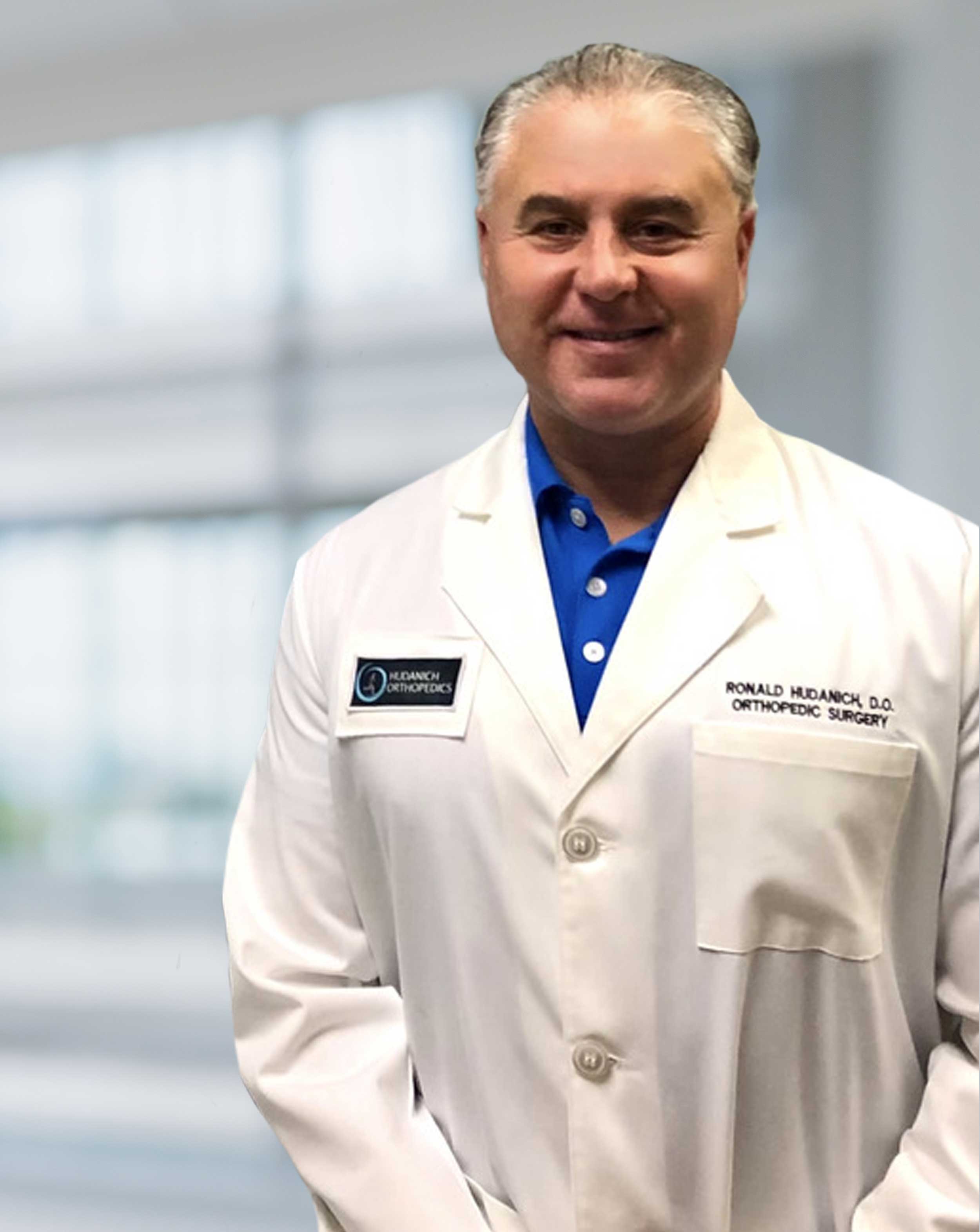 image of doctor ronald hudanich, hip and knee replacement specialist, robotic knee, orlando, orthopedic surgeon